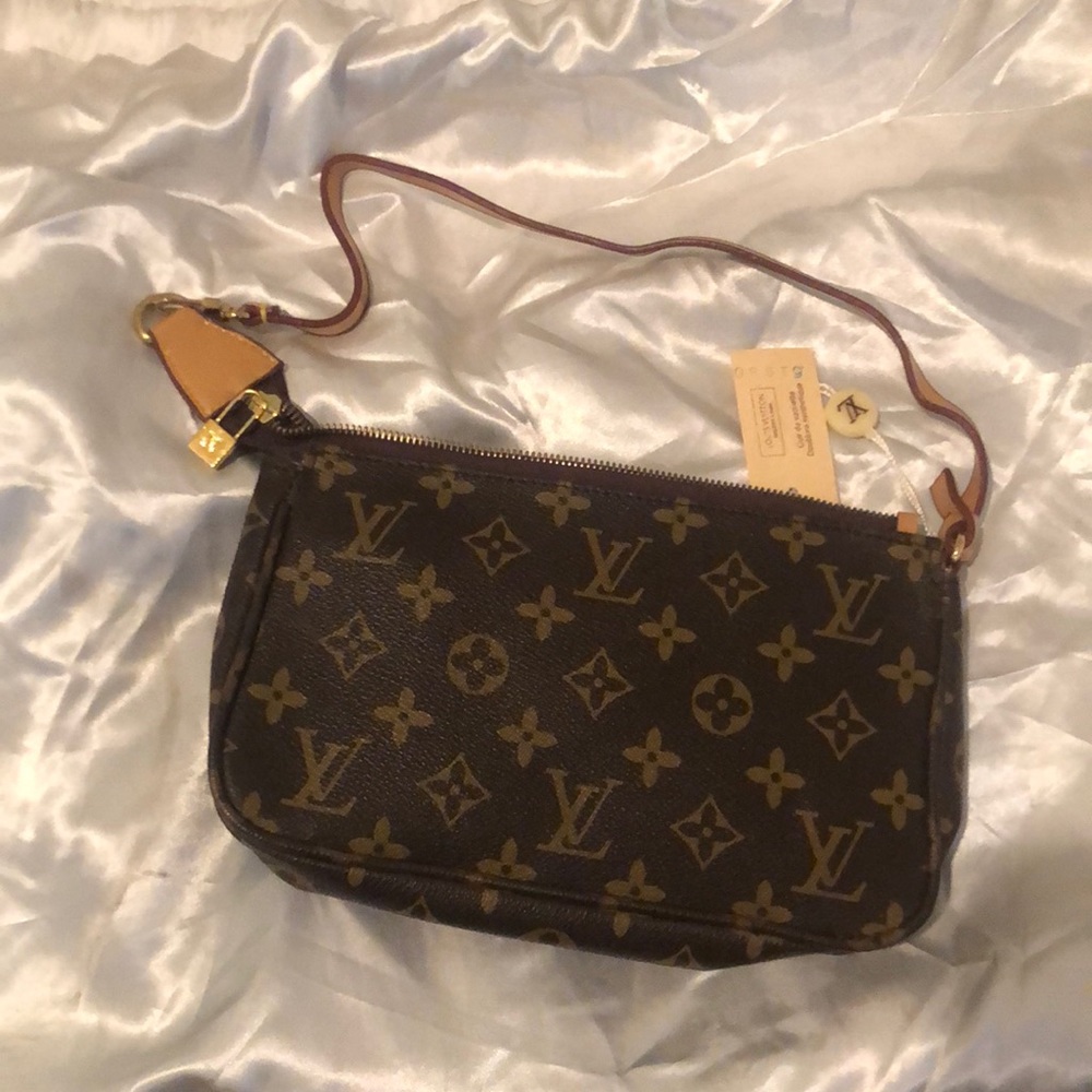 Brown and tan small clutch